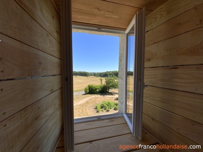 3 maisons dans un bâtiment caractéristique 